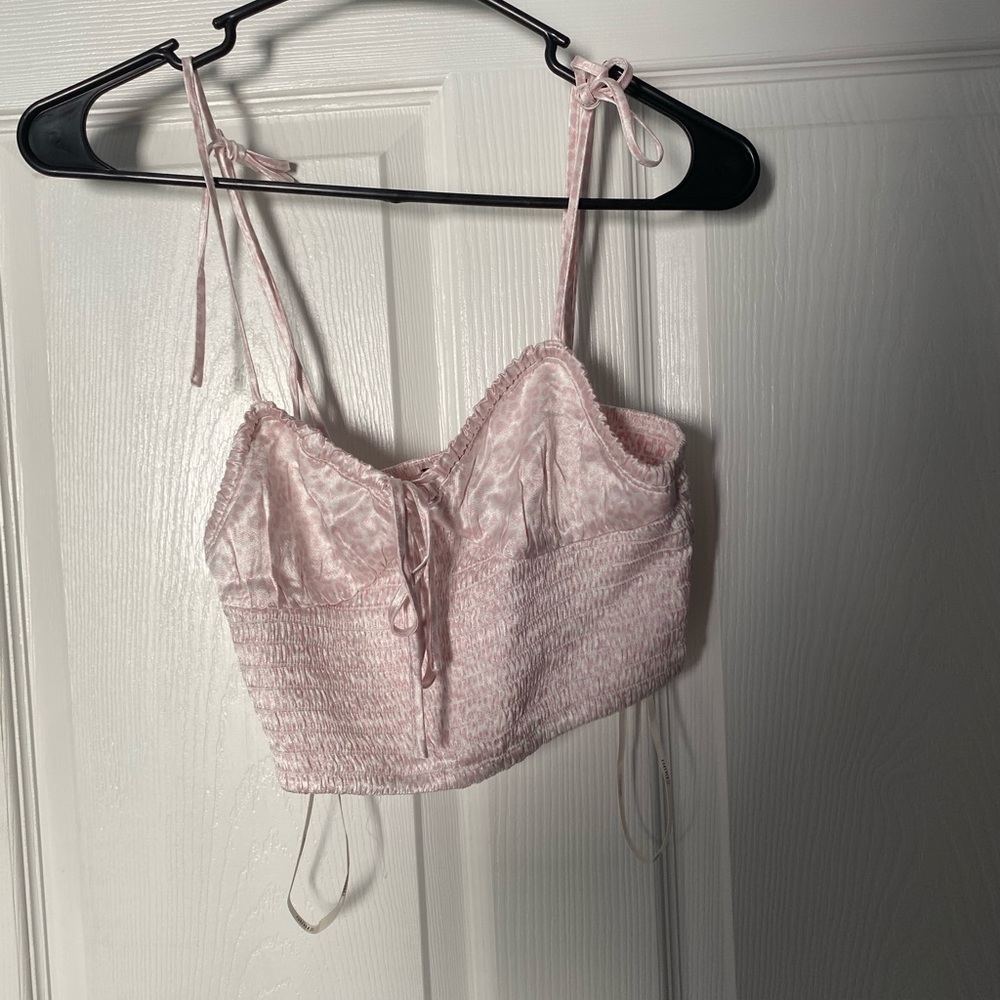 pink cropped top